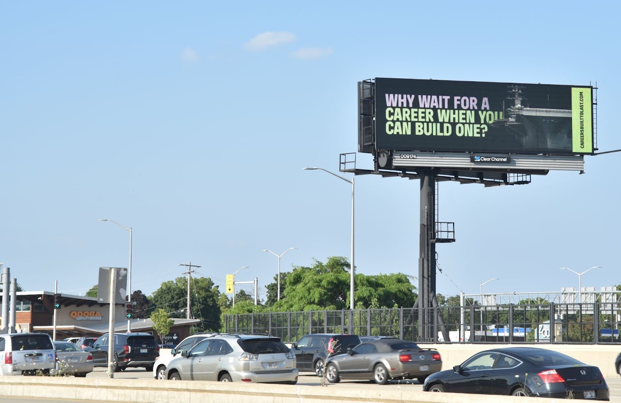 BlueForge Alliance carrier creative on Clear Channel highway billboard over traffic, Milwaukee