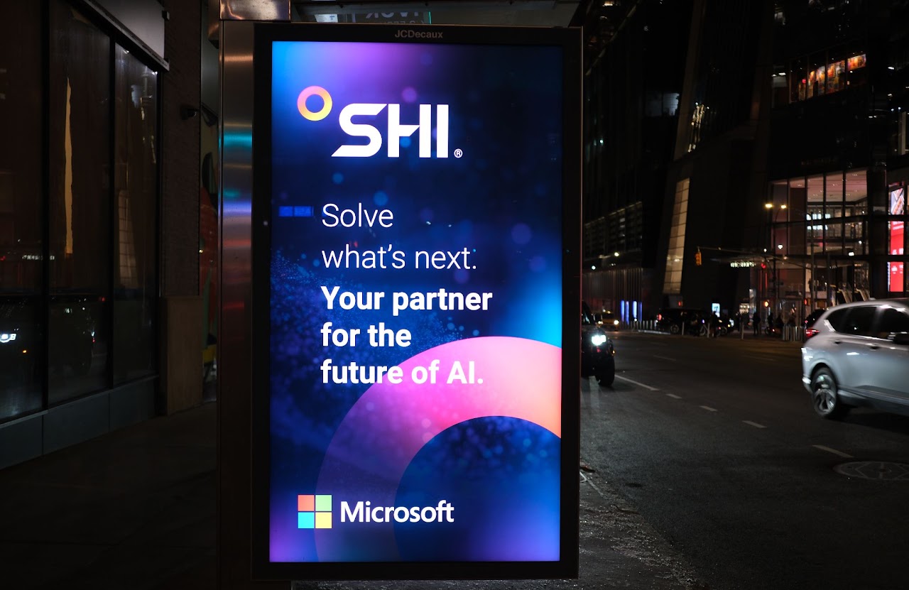 SHI x Microsoft bus shelter — close-up, NYC 10 Av & W 34 St