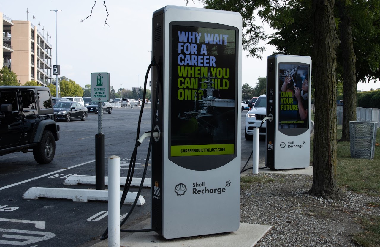 BlueForge Alliance 'Why Wait For A Career When You Can Build One' Shell Recharge EV charging station screen outside Guaranteed Rate Field, Chicago
