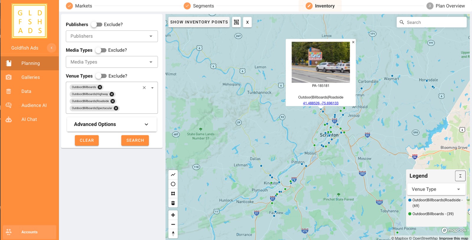The Goldfish Ads DOOH planning tool showing available digital billboards mapped across the Scranton, Pennsylvania market, with venue-type filters for roadside, highway, and spectacular billboards and a preview photo of an individual board.