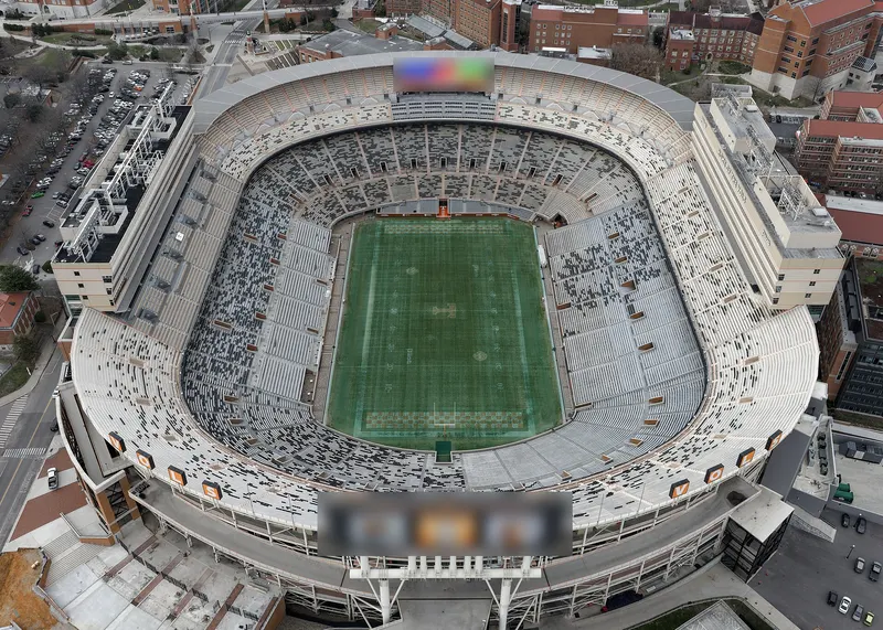 Aerial view of Neyland Stadium beside the Tennessee River in Knoxville.